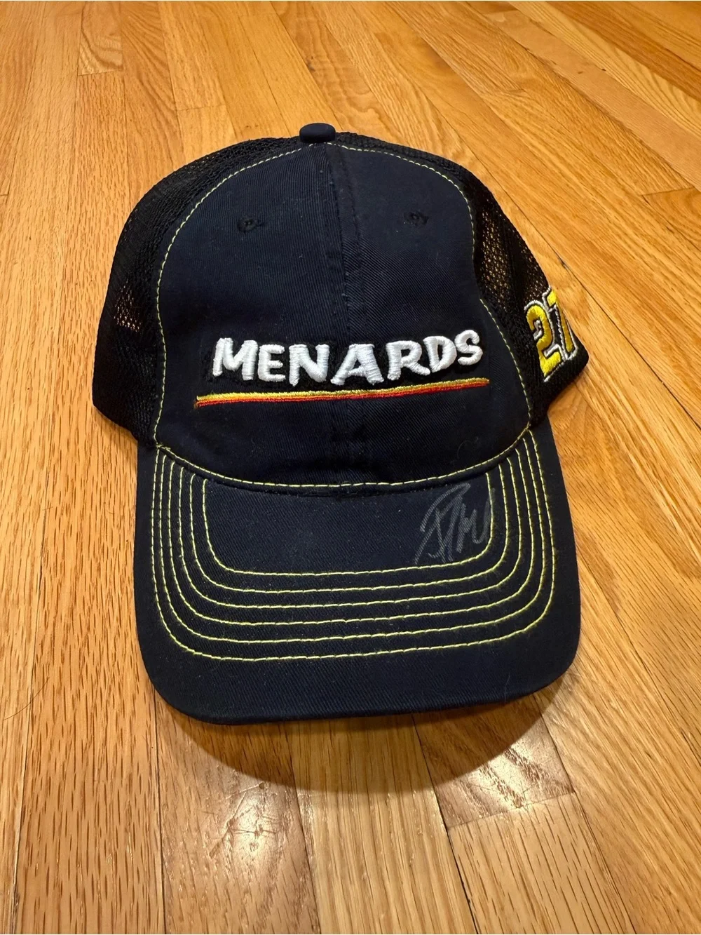 Menards Black Logo Trucker Hat with Yellow Stitching